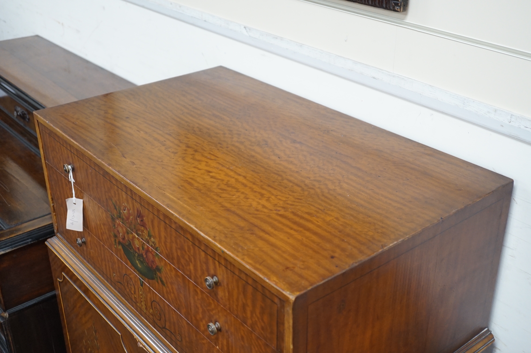 A mid 20th century painted satinwood press cupboard, width 86cm, depth 50cm, height 122cm